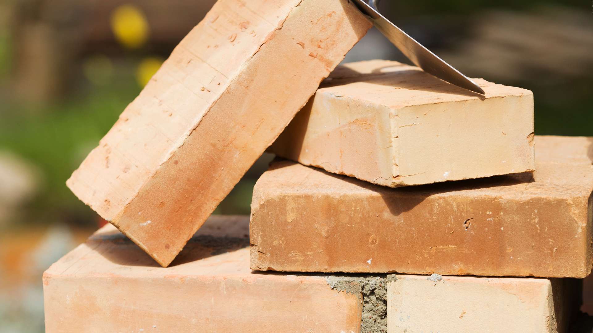 Flagstone Pavers vs. Manufactured Pavers: Which Holds Up in Queens